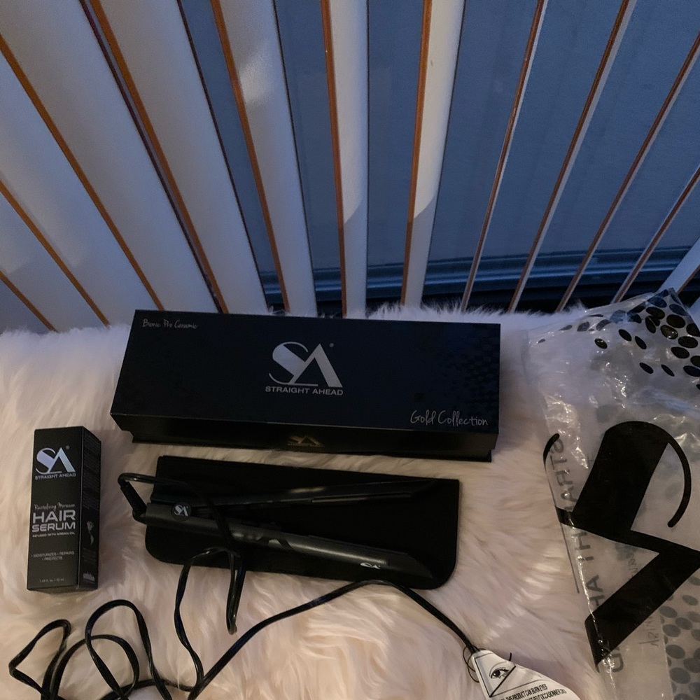 Brand new SA flat iron in original box and bag